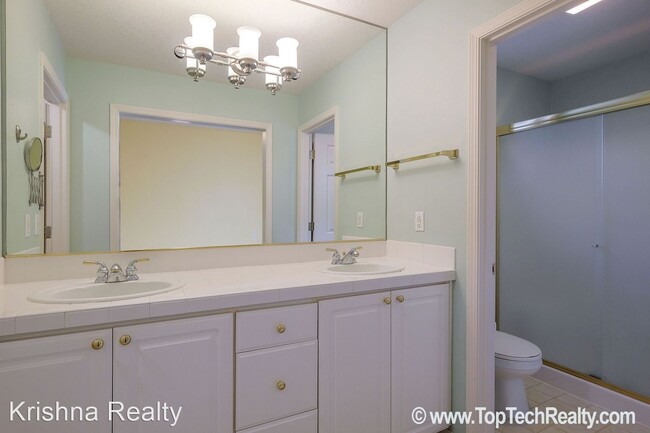 Building Photo - 4 br, 2.5 bath House - 5910 NW Snowlily Dr