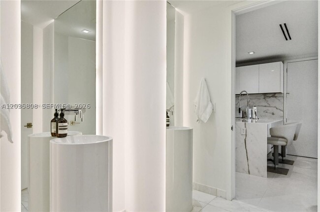 Building Photo - 10203 Collins Ave