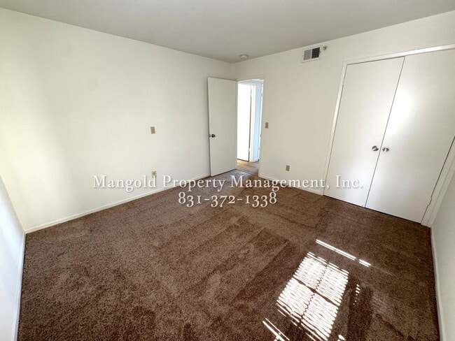 Building Photo - Spacious 2-Bed, 2-Bath Condo with Fireplac...