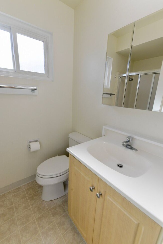 Building Photo - Sunny 2BR/2BA Coastal Retreat — Steps from the Sand with Ocean Breezes