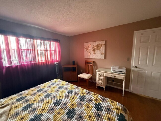 Building Photo - 8220 Sunrise Lakes Blvd