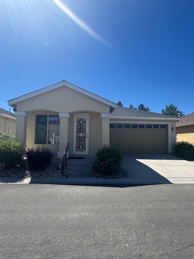 Building Photo - Located in a Quiet, Gated Community in Car...