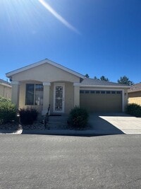 Building Photo - Located in a Quiet, Gated Community in Car...