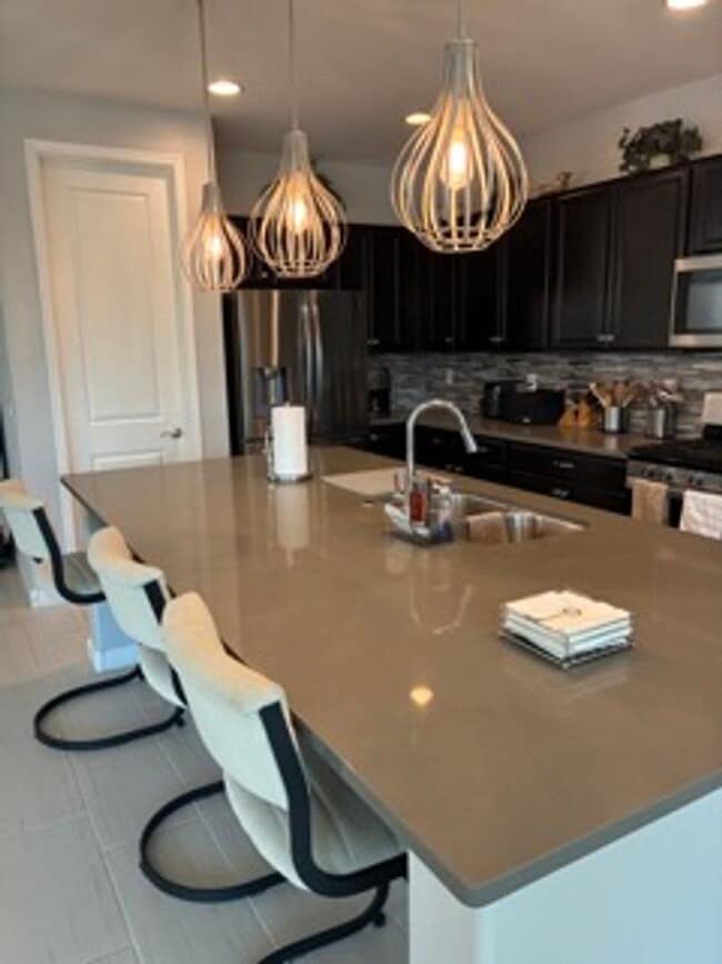 Building Photo - STUNNING NEWER HOME- GATED