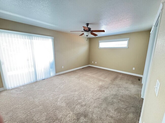 Building Photo - 4 BEDROOM, 3 BATHROOM TWINHOME WITH 2 CAR ATTACHED GARAGE IN NORTH CHEYENNE