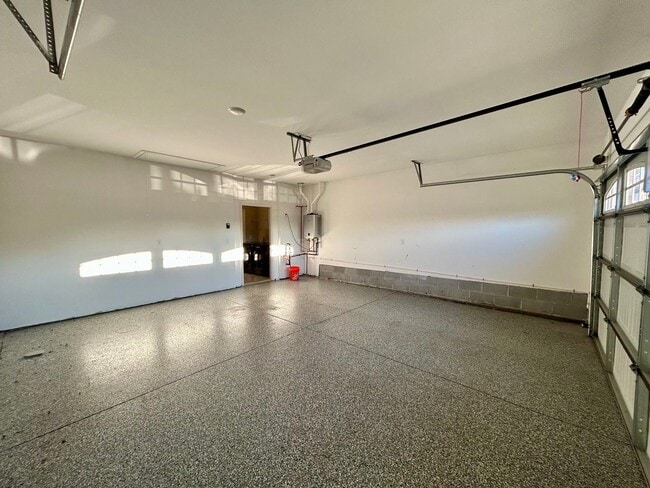 Building Photo - Spacious 3 bed, 3 bath home in Groves Park Commons featuring a modern kitchen, 2-car garage, and ...