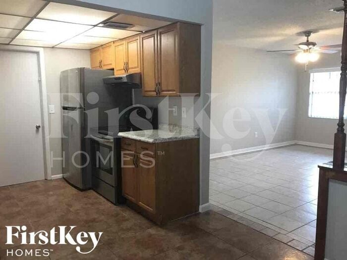 Building Photo - 8275 Jacaranda Ave