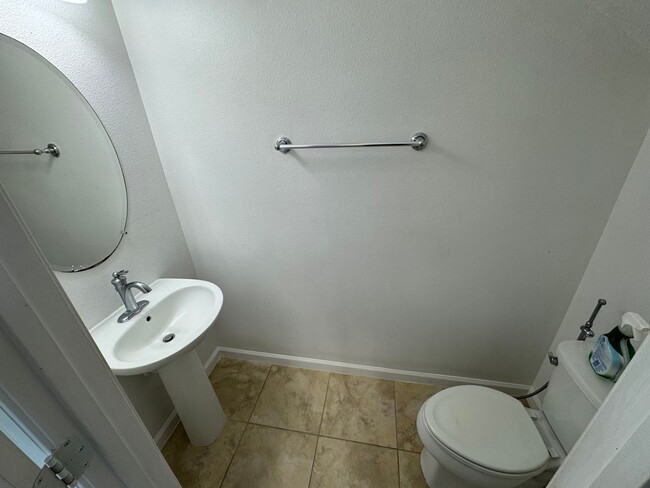 Building Photo - Lake Views. Upgraded Finishes. Gated Commu...