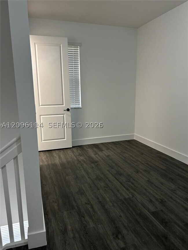 Building Photo - 9883 W 34th Ln