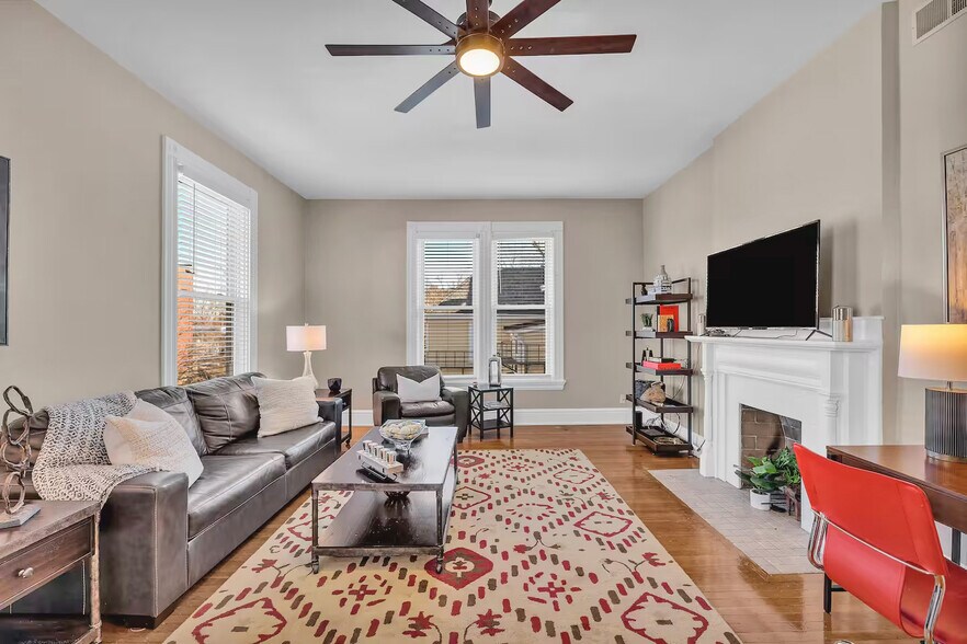 Spacious rooms with tall ceilings, huge windows and gleaming hardwood floors. - 1104 Cross Ln