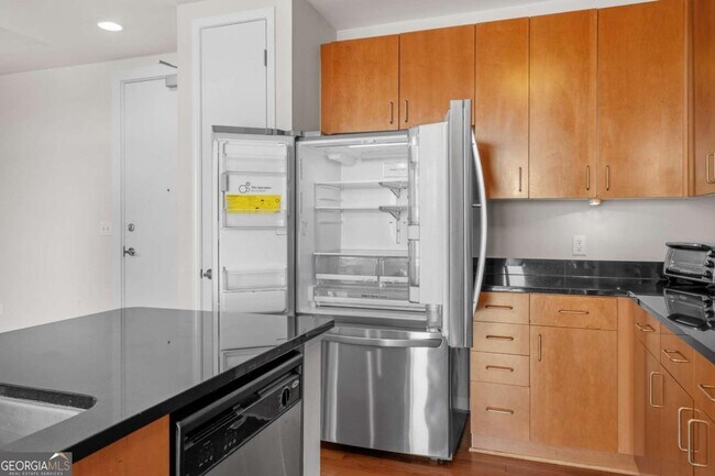 Building Photo - 711 Cosmopolitan Dr NE