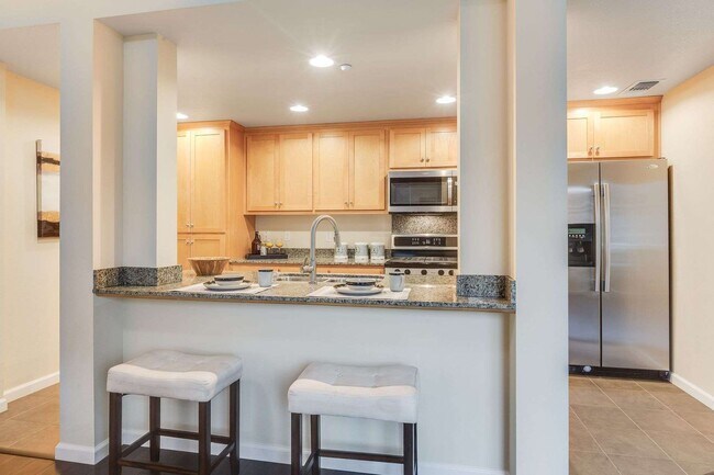 Building Photo - Stunning Top-Floor Condo with Open Layout, Modern Upgrades, and Prime Location 6 MONTH LEASE