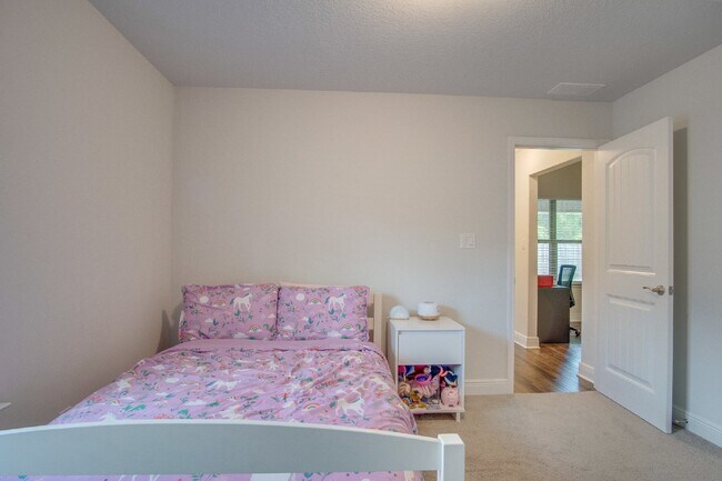 Building Photo - Spacious 4BR/2BA Brick Home with 2-Car Garage, Granite Kitchen, Vaulted Ceilings & Fully Fenced B...