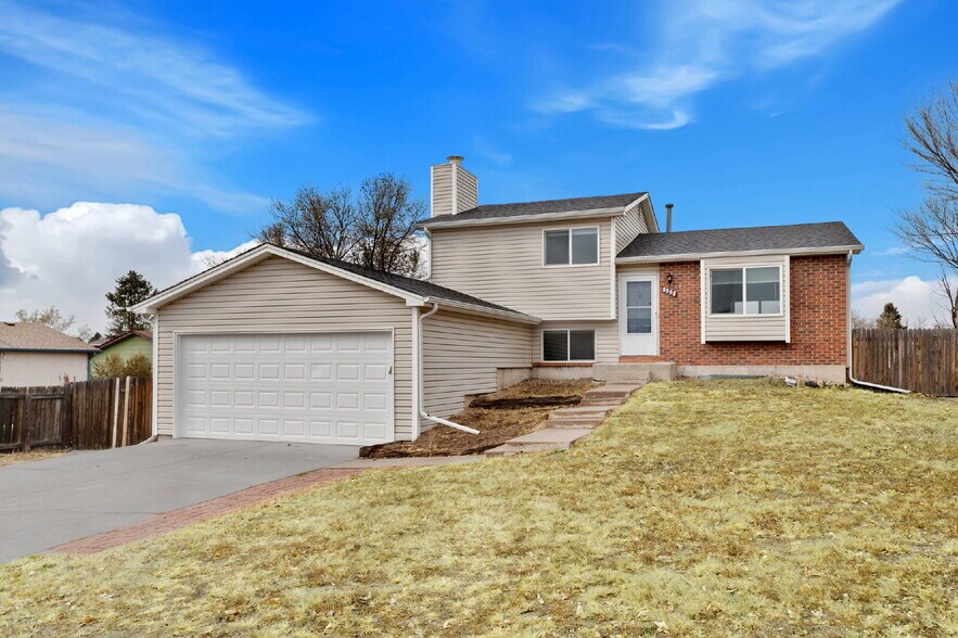 Building Photo - Corner Lot Charmer Near Fort Carson & Pete...
