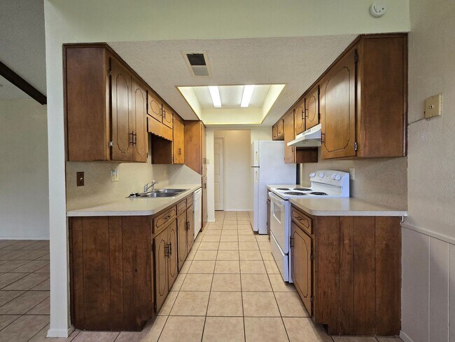 Building Photo - NEW IN MANAGEMENT - AVAILABLE NOW!