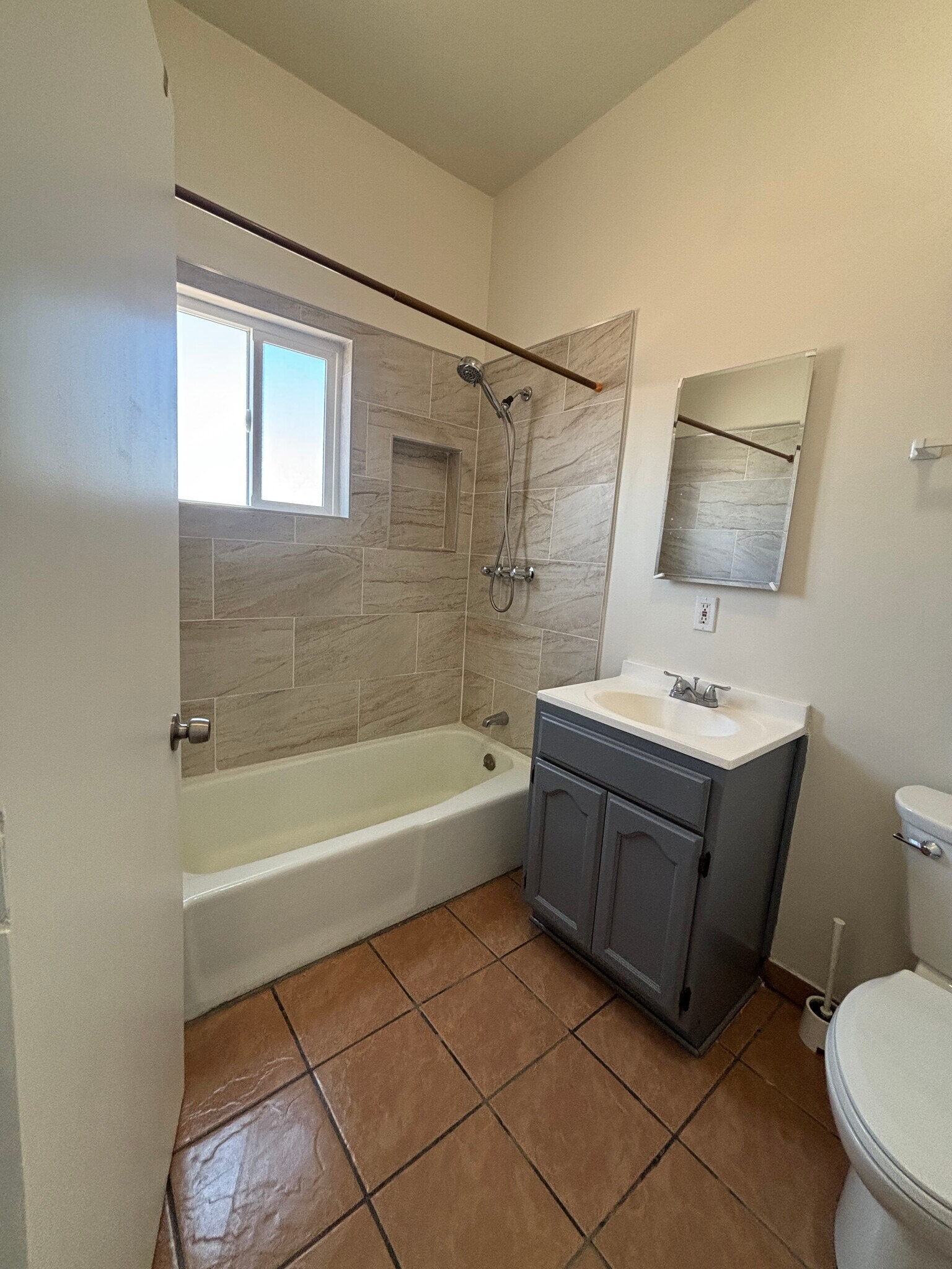 Updated Bathroom 1 - 1581 1/2 W 36th Pl