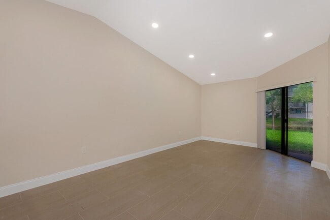 Building Photo - Fully Renovated Corner 1/1 “Villa” with Ba...