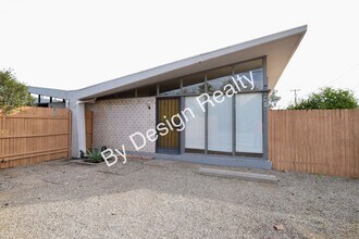 Building Photo - Sun-Drenched Mid-Century Living Near Garden District