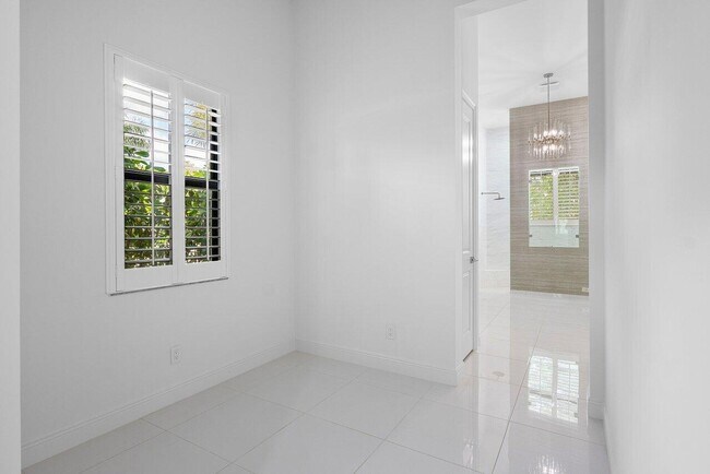 Building Photo - 6990 NW 27th Ave