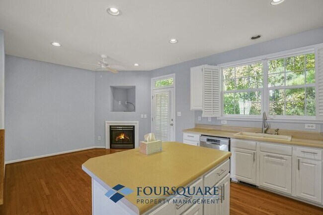 Building Photo - Lakefront Townhome with 1st Floor Bedroom, Fireplace & 2-Car Garage – In Raleigh