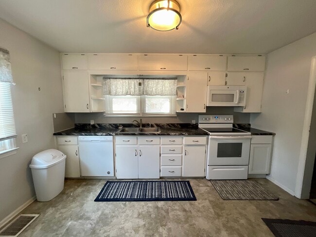 Building Photo - THE DEPOSIT MOVES YOU IN! No rent due until March 1st — the rest of February is FREE!