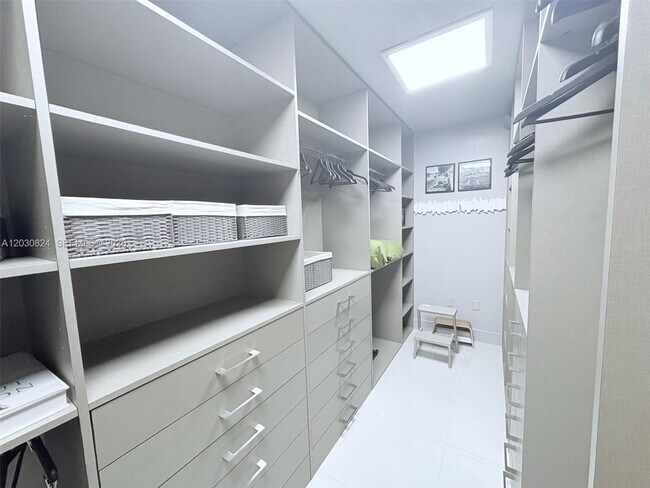 Building Photo - 10275 Collins Ave