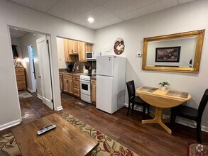 Building Photo - Furnished Temporary or Extended Stay Apart...