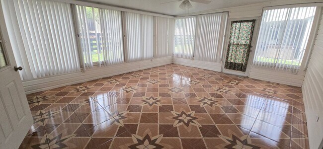 Building Photo - Move-In Ready 2BR/2BA Home with Solar & Bo...