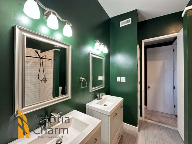 Building Photo - Beautifully Renovated 3BR Rowhome Near Johns Hopkins – Gated Parking + Modern Upgrades