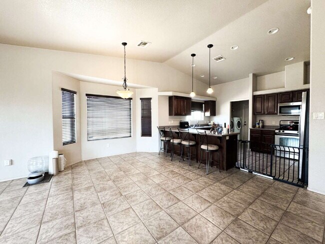 Building Photo - "Spacious 4-Bedroom, 2-Bathroom SOLAR Home in Mesa del Sol!"
