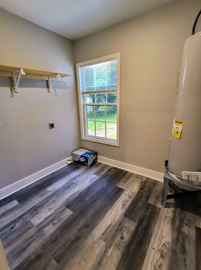 Building Photo - Fully Renovated 3-Bedroom Rental – New Appliances, Huge Yard, Garage, & Individual Room A/C!