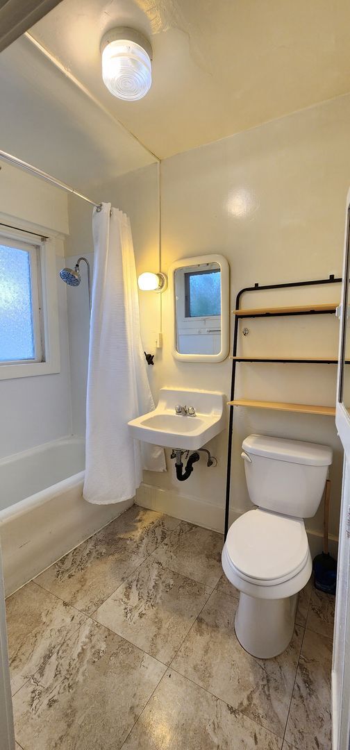 Building Photo - Coronado: Charming 1bd/1.25ba Village Apartment - Front Lower Unit