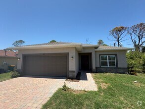 Building Photo - 3 Bed, 2 Bath Home with Screened Lanai & S...