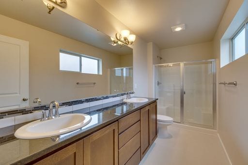 Building Photo - Mill Creek Townhome with 2 Car Garage Available Now!