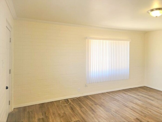 Building Photo - Spacious 2-Bed, 1-Bath Home | Large Shared Yard & Prime Commuter Access