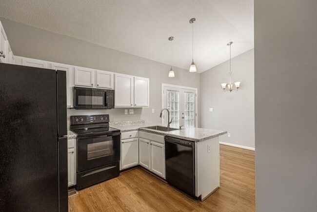 Building Photo - Like New Home off Freeman Mill. Just Painted, New Wood/Vinyl Flooring, Vaulted Ceilings, Front Po...