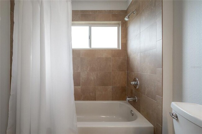 Building Photo - 10248 Woodford Bridge St