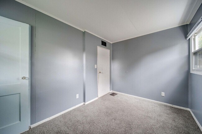 Building Photo - Affordable 3-Bedroom Home with Covered Pat...