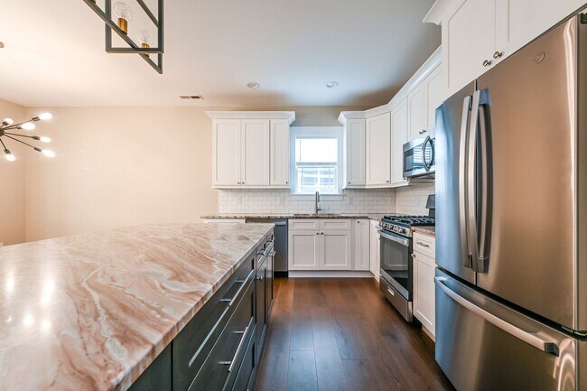 Building Photo - Beautifully Updated 3 Bedroom Home with Sunroom, Two-Car Garage, and Upscale Finishes