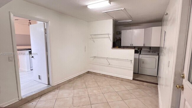 Building Photo - 10669 Boca Entrada Blvd
