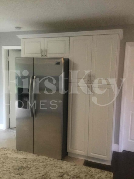 Building Photo - 5896 Triphammer Rd