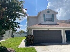 Building Photo - Stunning townhome in gated community near ...
