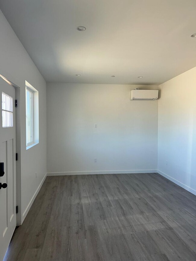 Building Photo - 9308 E Ave T 6