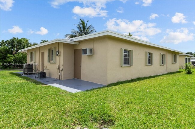 Building Photo - 7312 NW 58th Ct
