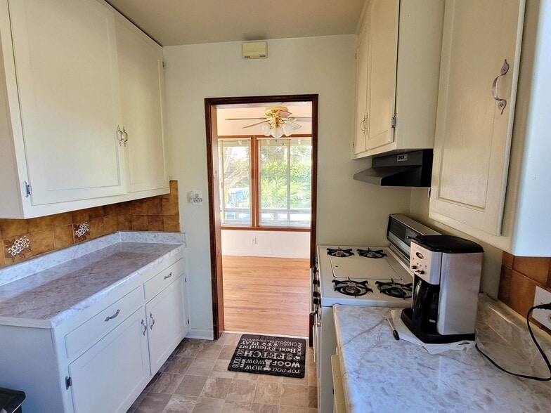 Range, Dishwasher, Refrigerator - 10740 Galvin St