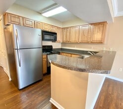 Building Photo - Laurel Station Condos #203 3BD/2BA $3000/MONTH includes 2 Assigned parking spaces! Move in 8/13/2026