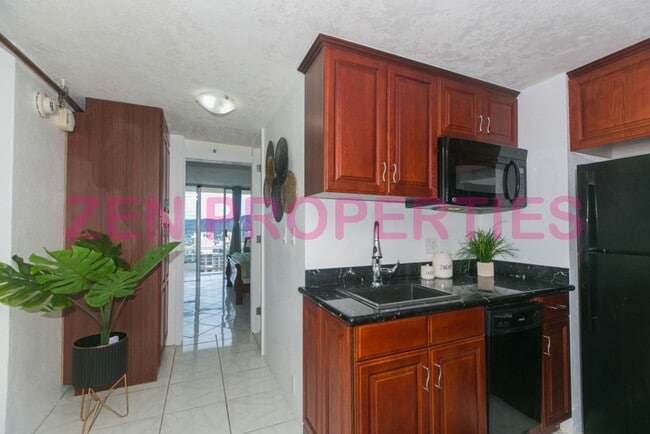 Building Photo - furnished 1 bedroom, 1 bath unit at Island Colony for rent.