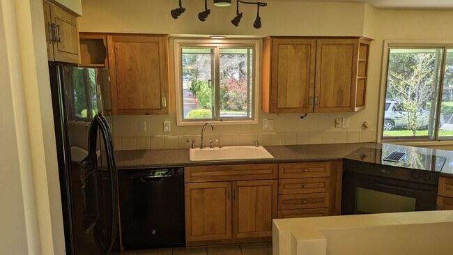 Building Photo - Spacious Three Bedroom with Large Backyard...
