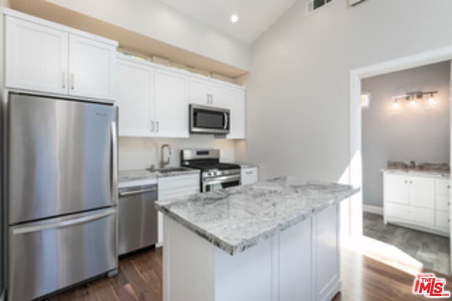 Building Photo - 7851 Airlane Ave