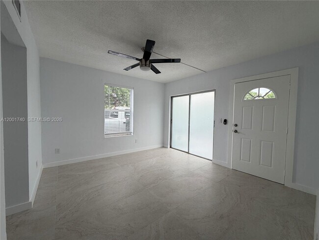 Building Photo - 5990 NE 4th Ct